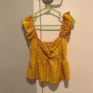 Yellow polka dot tank top with ruffle sleeves